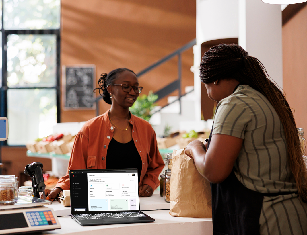 Business smiling with laptop